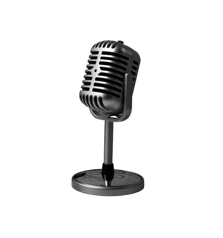 Vintage-style cardioid microphone on a round metal stand, angled as if ready for recording.