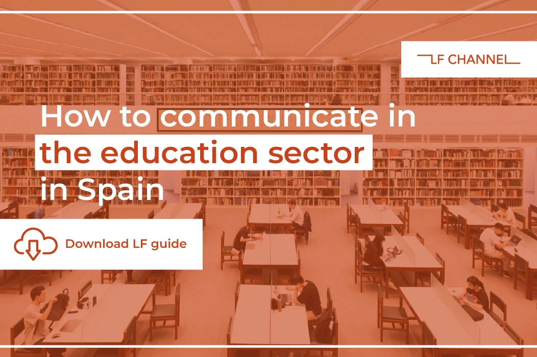 how_to_communicate_in_the_education_sector_in_spain_ENG Library study area with students at desks, orange overlay, and the headline 'How to communicate in the education sector in Spain' with a 'Download LF guide' button.